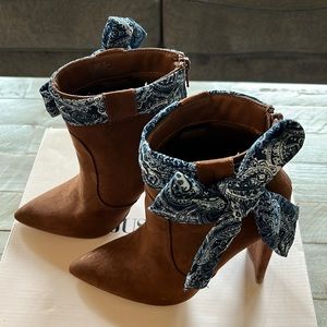 All filled up booties in whiskey by JUSTFAB size 6.5